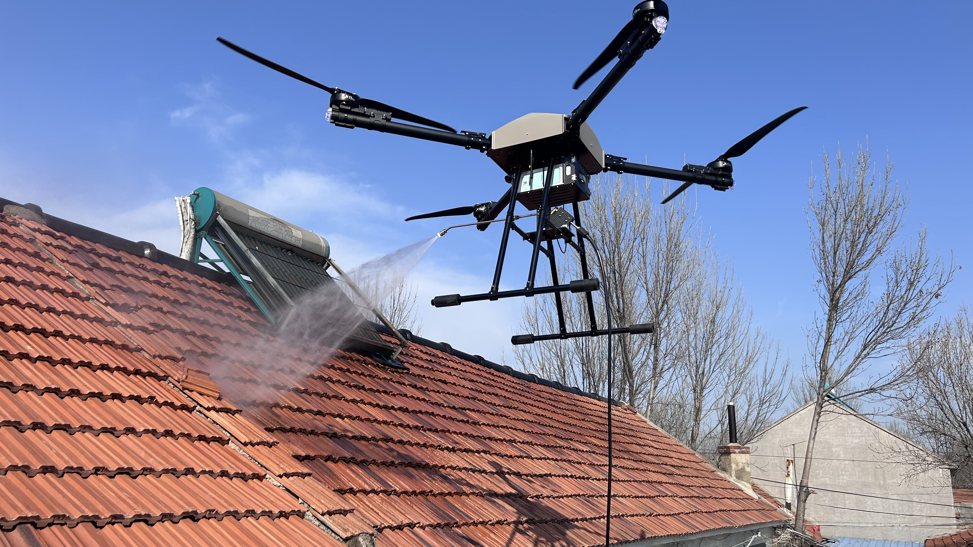 Drone cleaning a roof